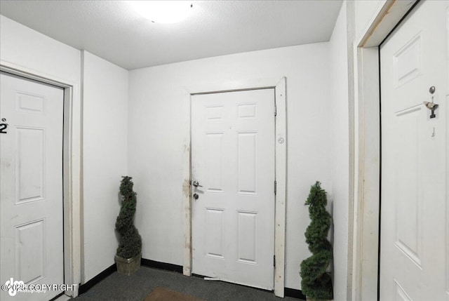 330 N Bliss St, Anchorage, AK 99508 - foyer featuring baseboards