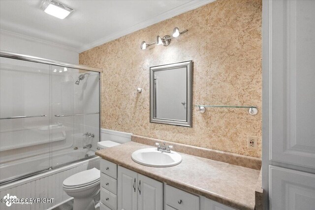 18723 N Lowrie Loop, Eagle River, AK 99577 - full bath featuring crown molding, vanity, bath / shower combo with glass door, and wallpapered walls