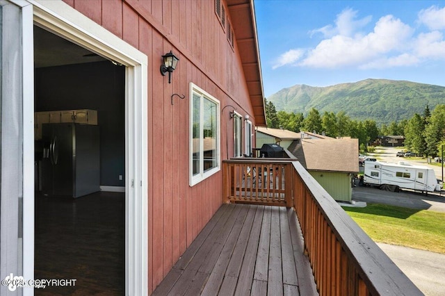 18723 N Lowrie Loop, Eagle River, AK 99577 - wooden terrace with a mountain view