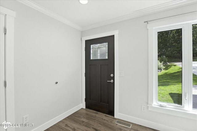 12220 Shiloh Rd, Anchorage, AK 99516 - entryway featuring crown molding and dark wood-type flooring