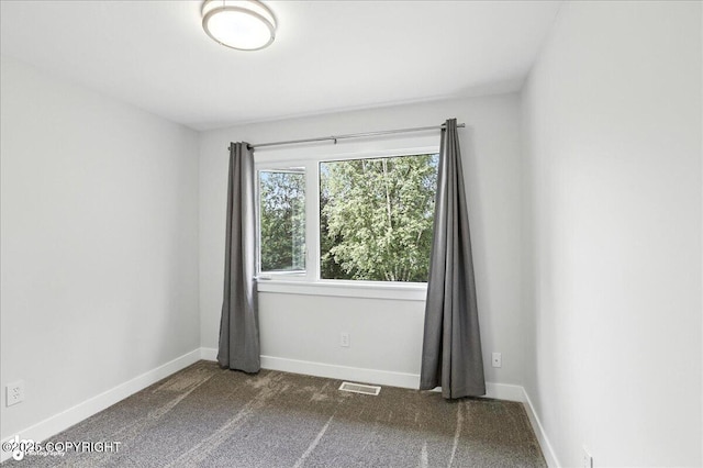 12220 Shiloh Rd, Anchorage, AK 99516 - carpeted empty room featuring baseboards