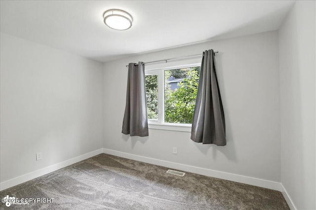 12220 Shiloh Rd, Anchorage, AK 99516 - carpeted spare room with baseboards