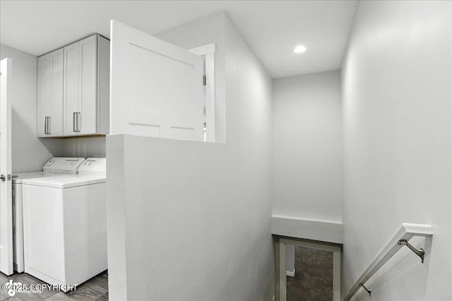 12220 Shiloh Rd, Anchorage, AK 99516 - washroom with washer and dryer, cabinet space, and recessed lighting