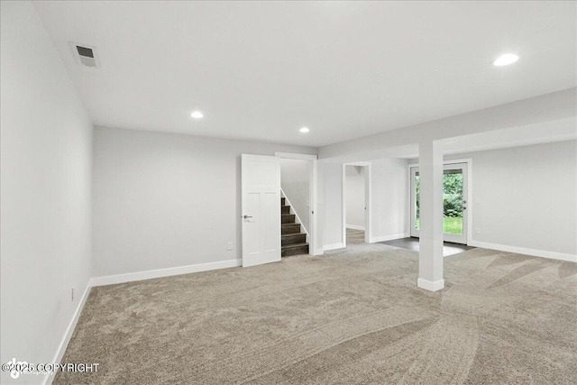 12220 Shiloh Rd, Anchorage, AK 99516 - basement featuring carpet, stairs, and recessed lighting