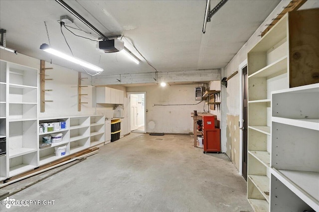 12220 Shiloh Rd, Anchorage, AK 99516 - garage featuring a garage door opener
