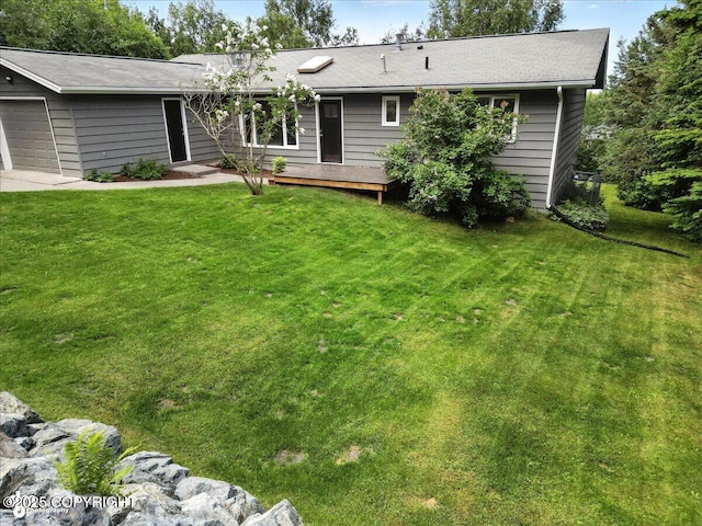 12220 Shiloh Rd, Anchorage, AK 99516 - rear view of property with a yard and a wooden deck