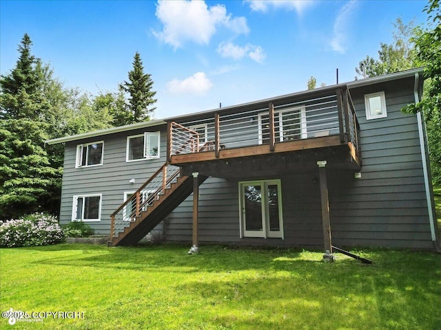12220 Shiloh Rd, Anchorage, AK 99516 - back of property with stairway, a lawn, and a wooden deck