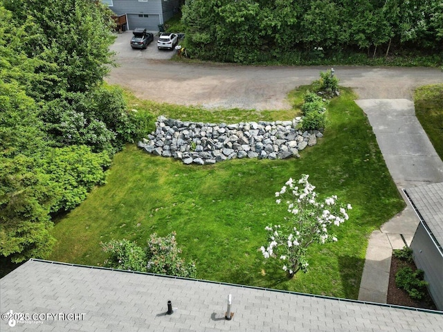12220 Shiloh Rd, Anchorage, AK 99516 - view of yard featuring a garage
