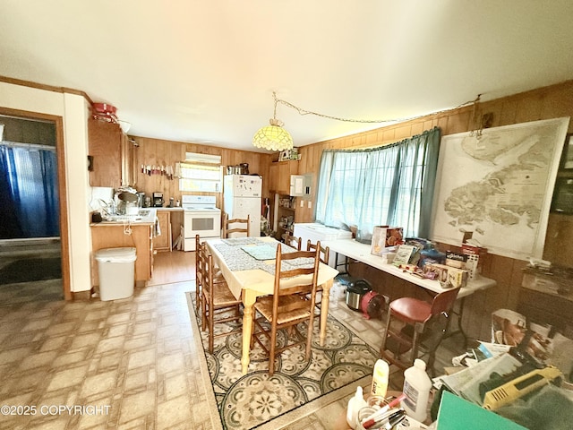 24220 Sterling Hwy, Ninilchik, AK 99639 - dining space featuring wood walls and washer / clothes dryer