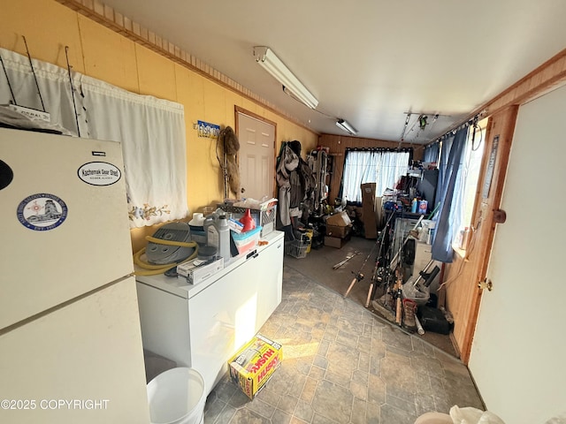 24220 Sterling Hwy, Ninilchik, AK 99639 - miscellaneous room featuring stone finish floors and wooden walls