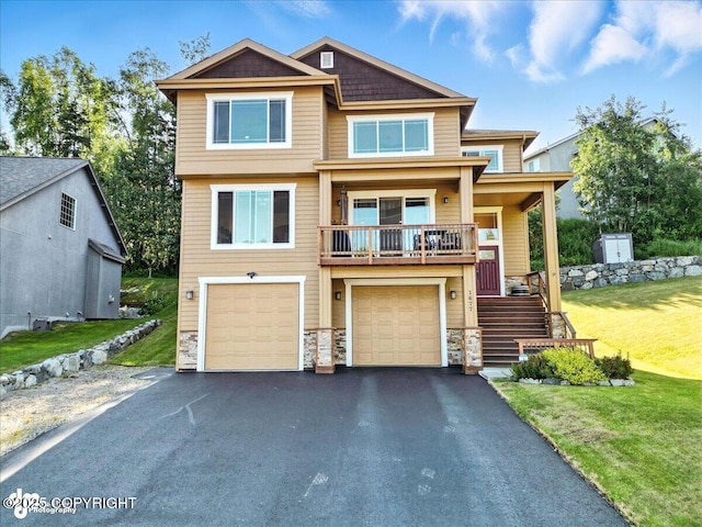 1677 Circlewood Dr, Anchorage, AK 99516 - view of front of property with stairway, driveway, a garage, stone siding, and a front yard