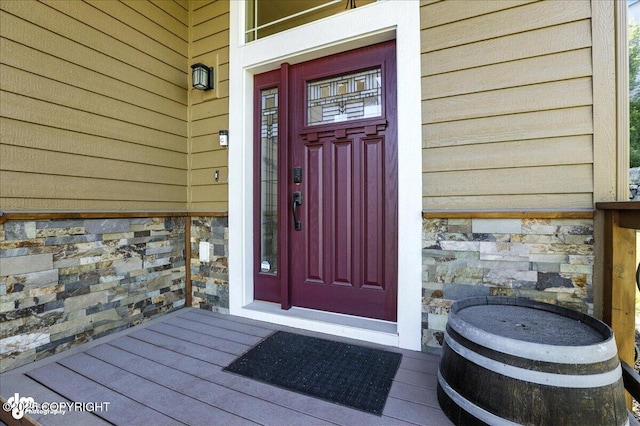 1677 Circlewood Dr, Anchorage, AK 99516 - doorway to property with stone siding