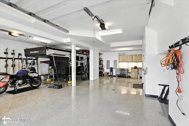 1677 Circlewood Dr, Anchorage, AK 99516 - garage featuring a garage door opener and electric panel