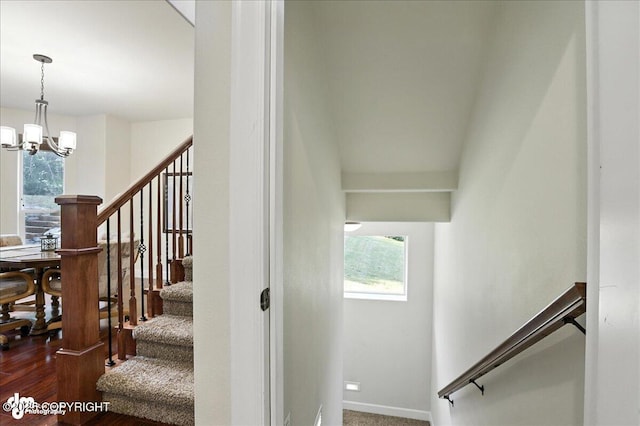 1677 Circlewood Dr, Anchorage, AK 99516 - stairway with a chandelier and wood finished floors