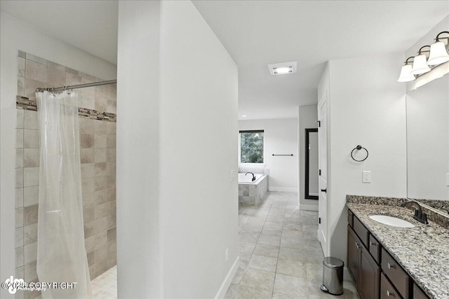 1677 Circlewood Dr, Anchorage, AK 99516 - full bathroom featuring a garden tub, a tile shower, vanity, and tile patterned flooring