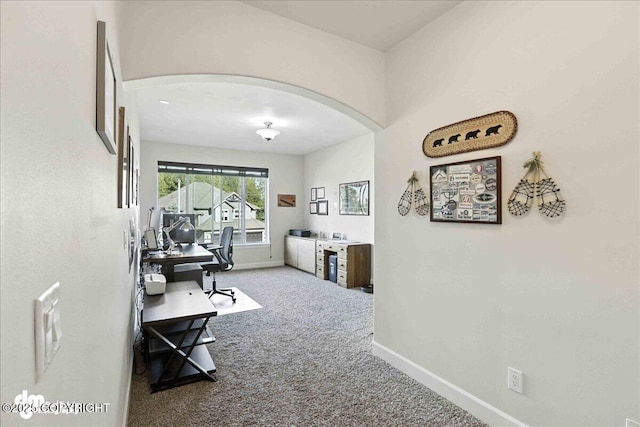 1677 Circlewood Dr, Anchorage, AK 99516 - hall with arched walkways, a desk, and carpet