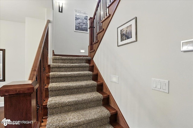 1677 Circlewood Dr, Anchorage, AK 99516 - stairs featuring baseboards