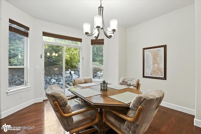1677 Circlewood Dr, Anchorage, AK 99516 - dining space featuring a chandelier and dark wood-type flooring