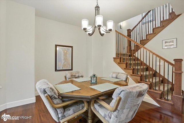 1677 Circlewood Dr, Anchorage, AK 99516 - dining area featuring a chandelier, wood finished floors, and stairway