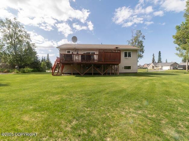 1207 Portside Dr, Kenai, AK 99611 - back of house featuring a wooden deck, a yard, and stairs