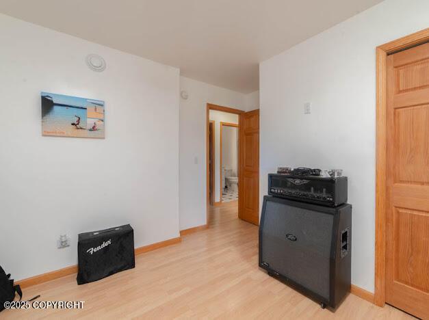 1207 Portside Dr, Kenai, AK 99611 - interior space featuring light wood-style floors and baseboards