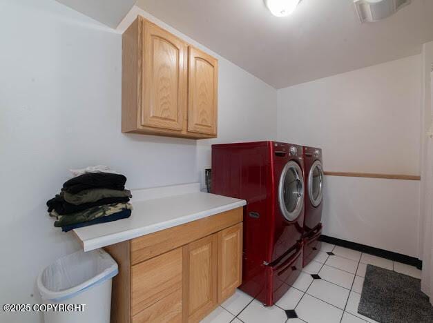 1207 Portside Dr, Kenai, AK 99611 - washroom with cabinet space, washing machine and dryer, and light tile patterned flooring