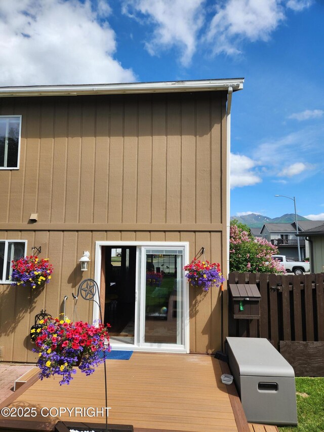 3920 Red Talon Dr, Anchorage, AK 99507 - back of house featuring a wooden deck