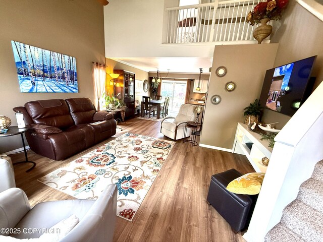 3920 Red Talon Dr, Anchorage, AK 99507 - living room with a high ceiling and wood finished floors