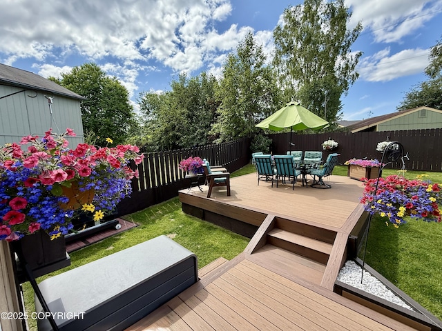 3920 Red Talon Dr, Anchorage, AK 99507 - deck featuring a fenced backyard and outdoor dining area