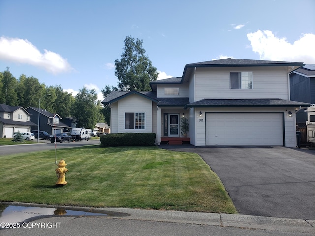 801 Howard Cir, Anchorage, AK 99504 - traditional home with an attached garage, a front yard, driveway, and a residential view