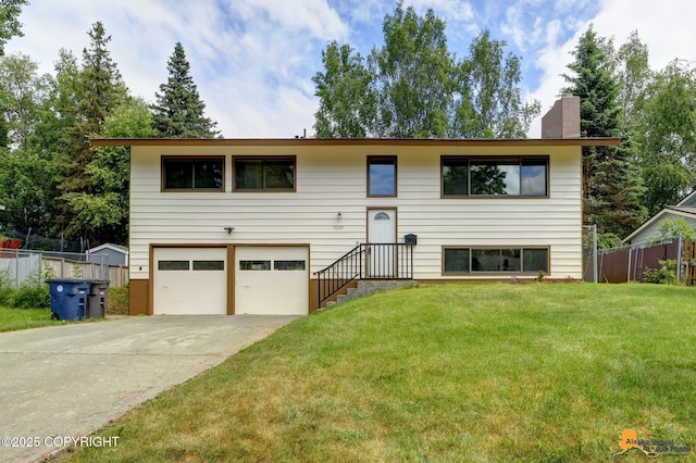 3223 Madison Way, Anchorage, AK 99508 - view of front of home featuring a garage, concrete driveway, and a chimney