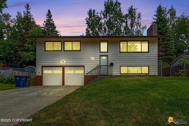 3223 Madison Way, Anchorage, AK 99508 - view of front of property featuring an attached garage, concrete driveway, and a chimney
