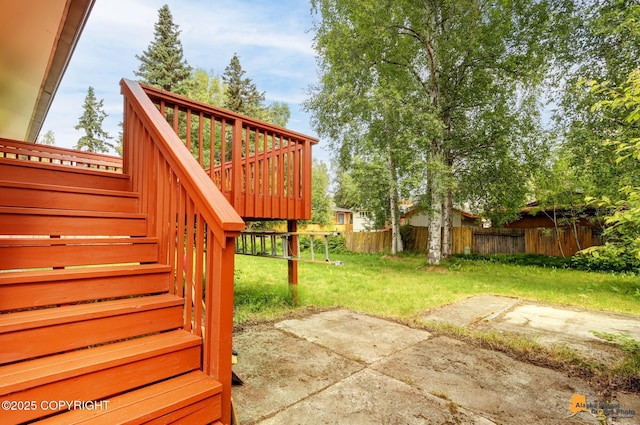 3223 Madison Way, Anchorage, AK 99508 - view of yard with a patio area, a wooden deck, and stairway