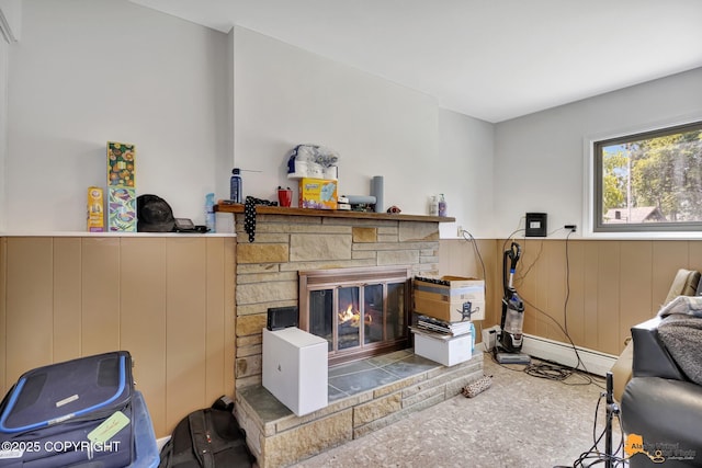 3223 Madison Way, Anchorage, AK 99508 - living area with a stone fireplace and a baseboard radiator