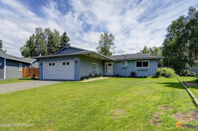 4800 Carousel Cir, Anchorage, AK 99502 - single story home with driveway and an attached garage