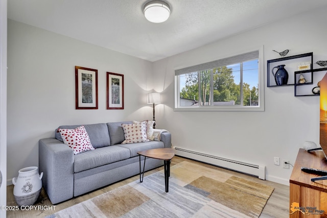 4800 Carousel Cir, Anchorage, AK 99502 - living room with a baseboard heating unit and wood finished floors