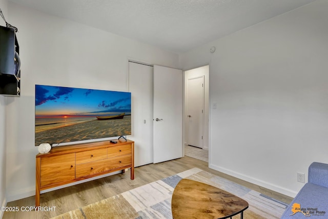 4800 Carousel Cir, Anchorage, AK 99502 - living room featuring wood finished floors and baseboards
