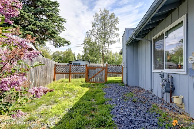 4800 Carousel Cir, Anchorage, AK 99502 - view of yard with a gate