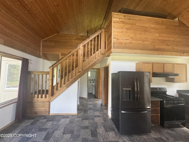 21577 Evelyn May St, Kasilof, AK 99610 - kitchen featuring refrigerator with ice dispenser, gas stove, wood ceiling, wooden walls, and vaulted ceiling