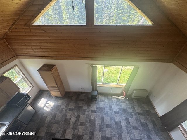 21577 Evelyn May St, Kasilof, AK 99610 - unfurnished living room featuring wooden ceiling and vaulted ceiling