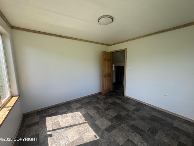 21577 Evelyn May St, Kasilof, AK 99610 - unfurnished room with baseboards and crown molding