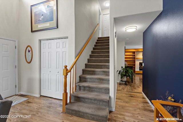 2943 Kingfisher Dr, Anchorage, AK 99502 - foyer entrance with stairway and wood finished floors