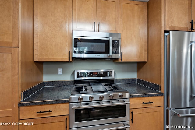 2943 Kingfisher Dr, Anchorage, AK 99502 - kitchen featuring stainless steel appliances and dark countertops