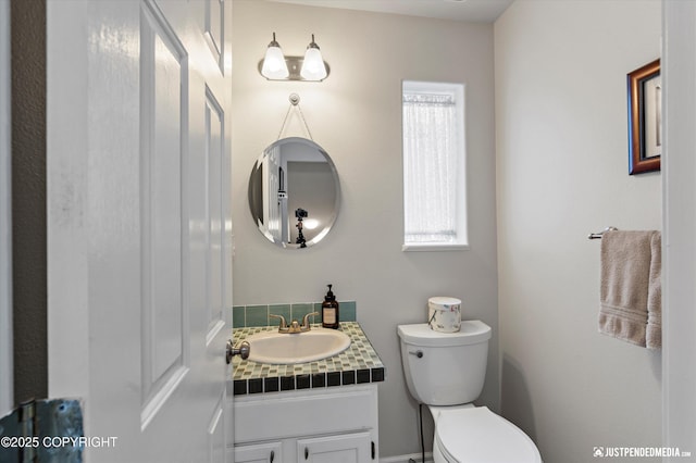 2943 Kingfisher Dr, Anchorage, AK 99502 - half bath featuring toilet and vanity