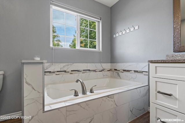 2943 Kingfisher Dr, Anchorage, AK 99502 - bathroom with vanity and a garden tub