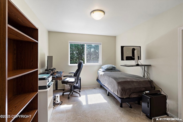 2943 Kingfisher Dr, Anchorage, AK 99502 - bedroom featuring a desk and carpet floors