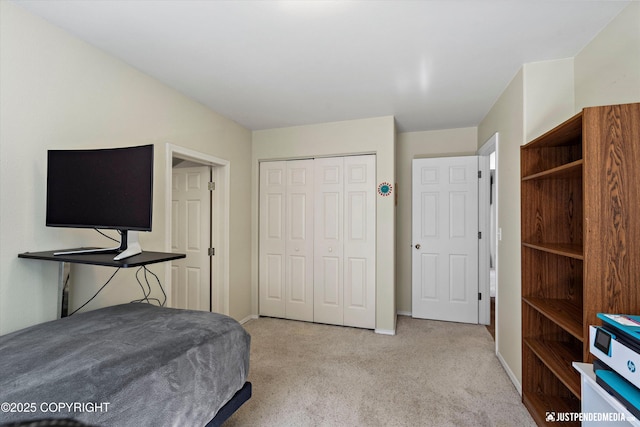 2943 Kingfisher Dr, Anchorage, AK 99502 - bedroom featuring light carpet and a closet