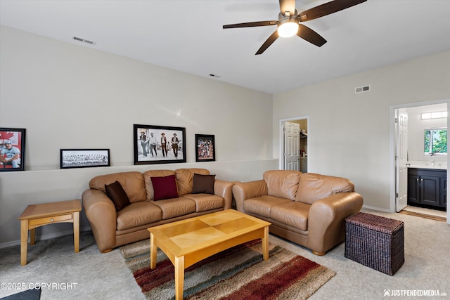 2943 Kingfisher Dr, Anchorage, AK 99502 - living area with a ceiling fan and light colored carpet