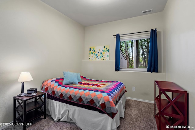 2943 Kingfisher Dr, Anchorage, AK 99502 - carpeted bedroom featuring baseboards