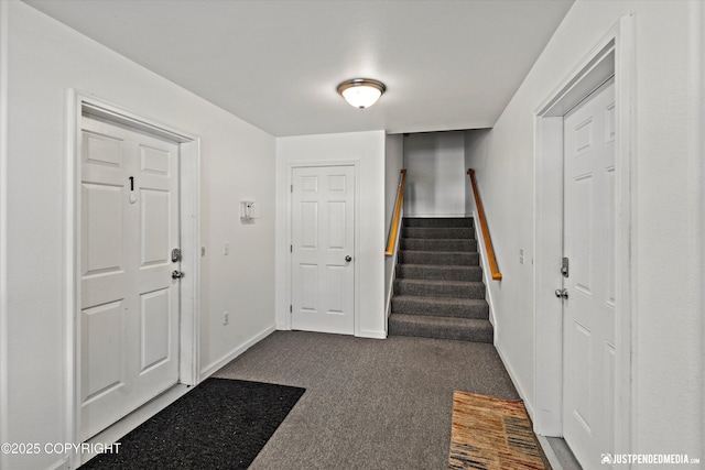 1786 E Neil Cir # 4, Wasilla, AK 99654 - foyer entrance featuring dark colored carpet and stairs